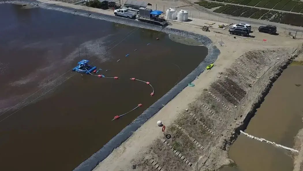 Floating dredge sled designed for shallow mine ponds offering efficient sediment recovery and cost-effective pond cleaning