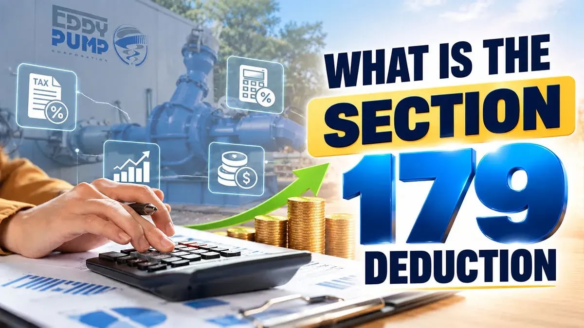 Person using a calculator over financial charts beside an EDDY Pump slurry pump, illustrating what the Section 179 deduction is