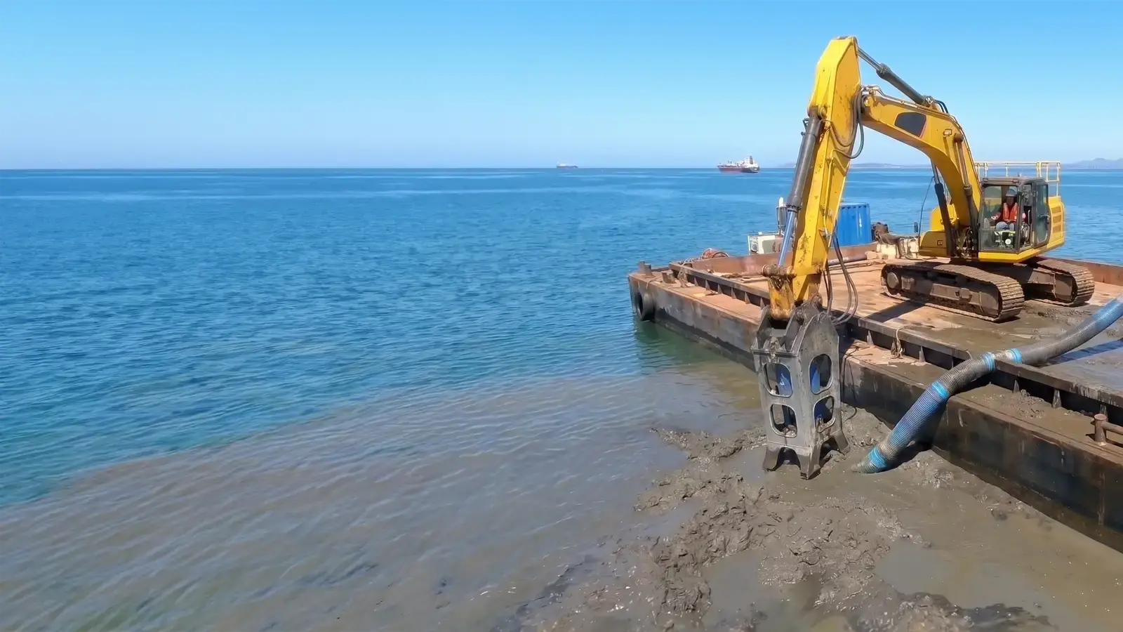 Featured image showing a marine excavator with a mounted dredge pump attachment working over water during a pump setup upgrade.